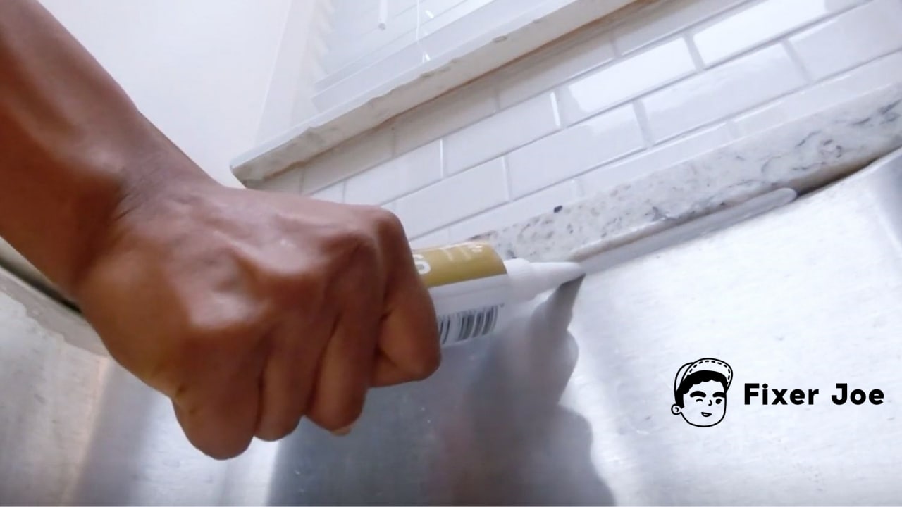 Secure cabinets and countertop with caulk
